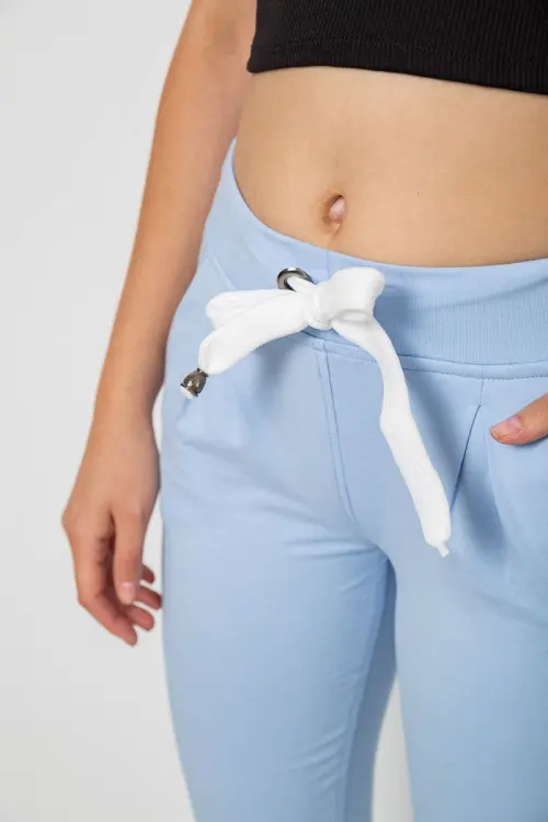 Women's sports pants, light blue color, 244R1807-1
